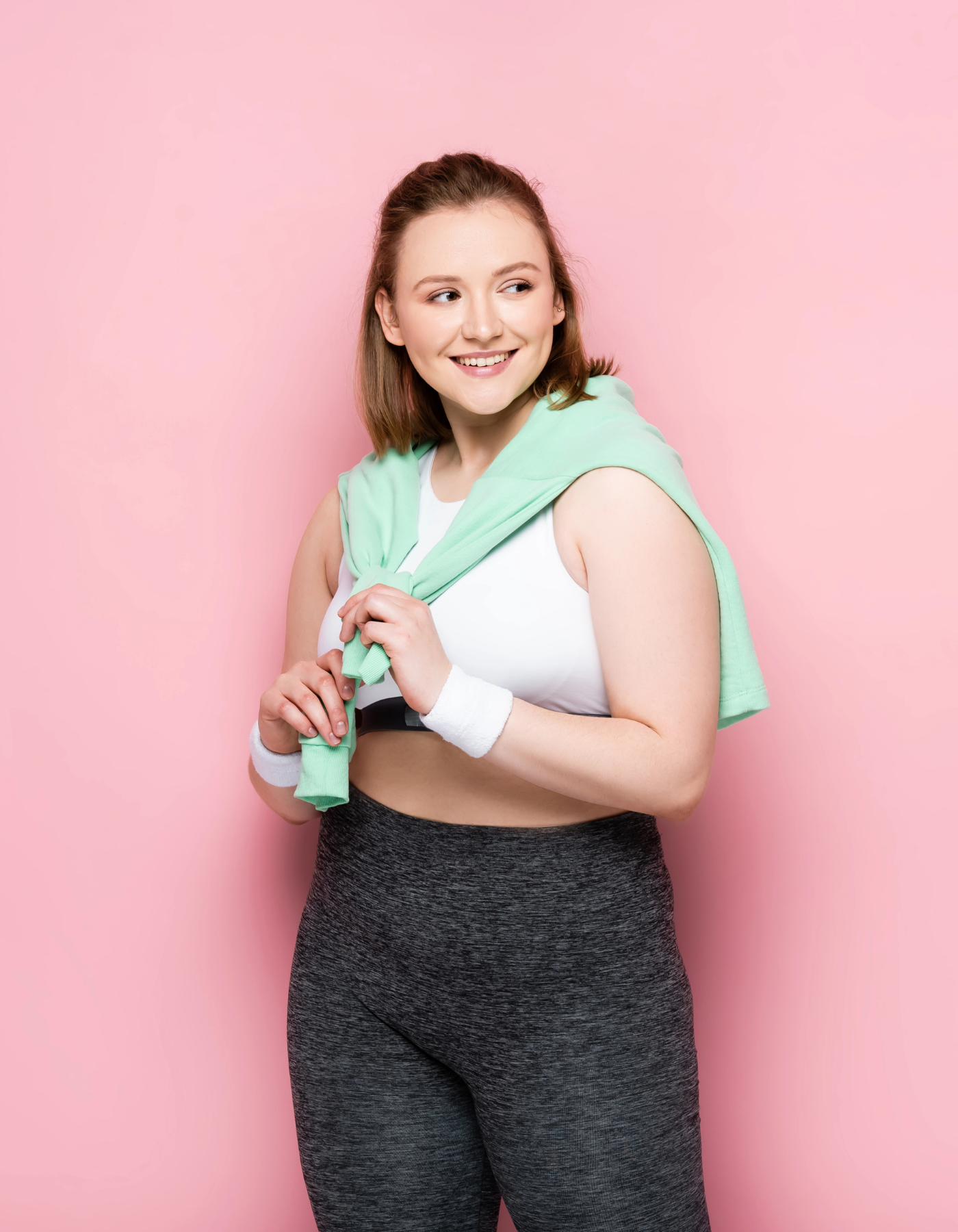 Žena ve sportovním oblečení – zdravý životní styl a BMI